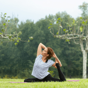 young-beautiful-woman-doing-yoga-exercise-green-park